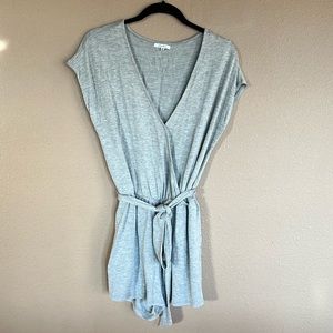 Cute romper in light grey. Size M